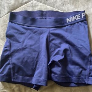 Blue Nike pros
